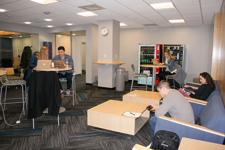 Students study in the Business School student lounge