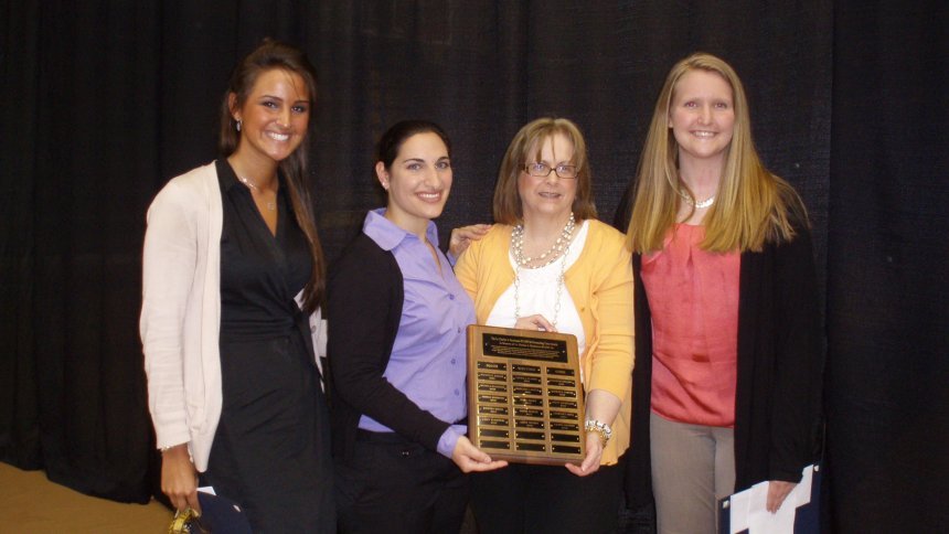 From left: 2012 Henderson Outstanding Tutor Award recipients Casey Klosowski in math, Lauren Salerno in science, (Coordinator of the Writing Center Karen Bilotti) and Leigh Wilmot in writing.