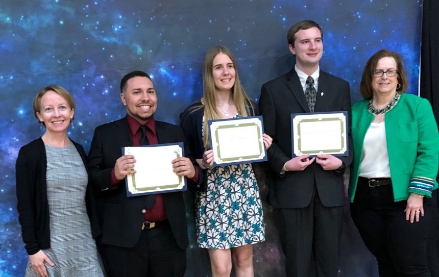 From left: 2019 Henderson Outstanding Tutor Award recipients Shawn DaRosa in science, Kaia Lindberg in math, and Nelson "Trey" Powers in writing.  They are congratulated by Coordinator of Science Center Tracey McDonnell Wysor (far left) and Coordinator of Writing Center Karen Bilotti (far right).