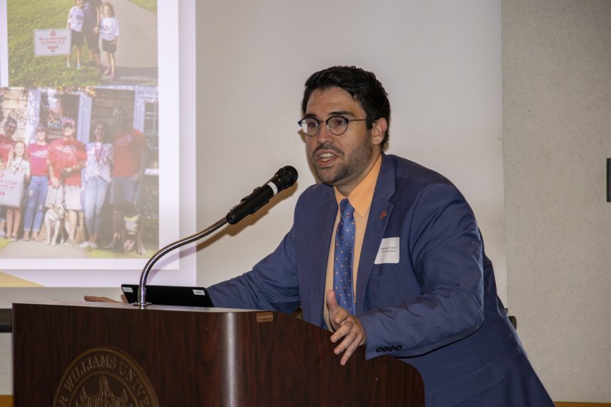 RWU MPA alumnus Joshua Avila addresses the 2022 RIASPA Conference