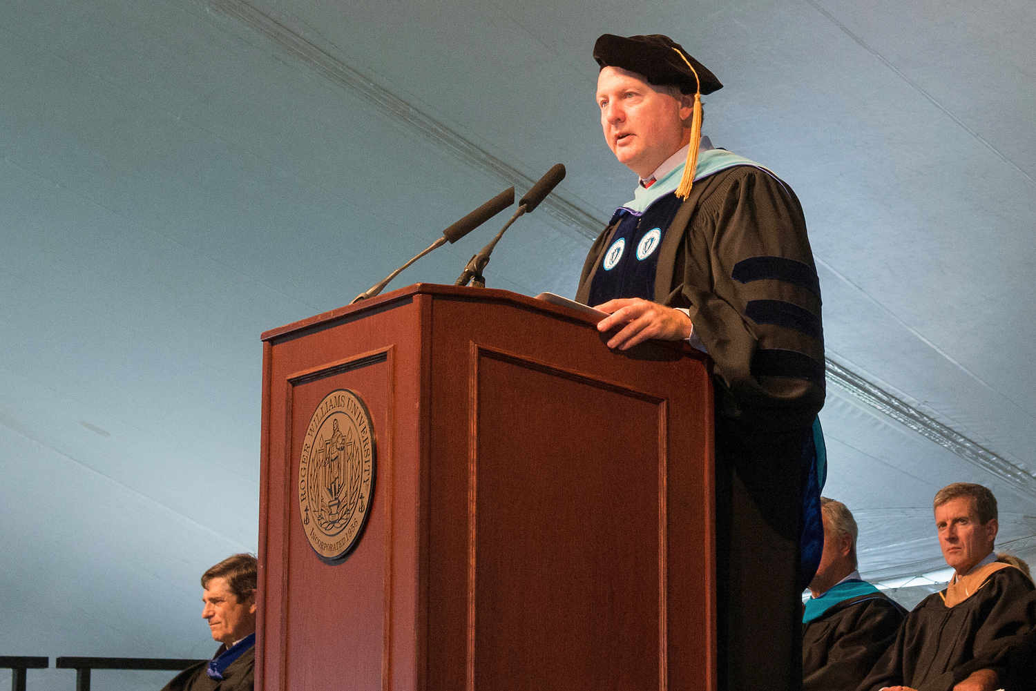 Vice President for Student Life John J. King speaks at the 2016 Commencement ceremony at the Bristol campus.
