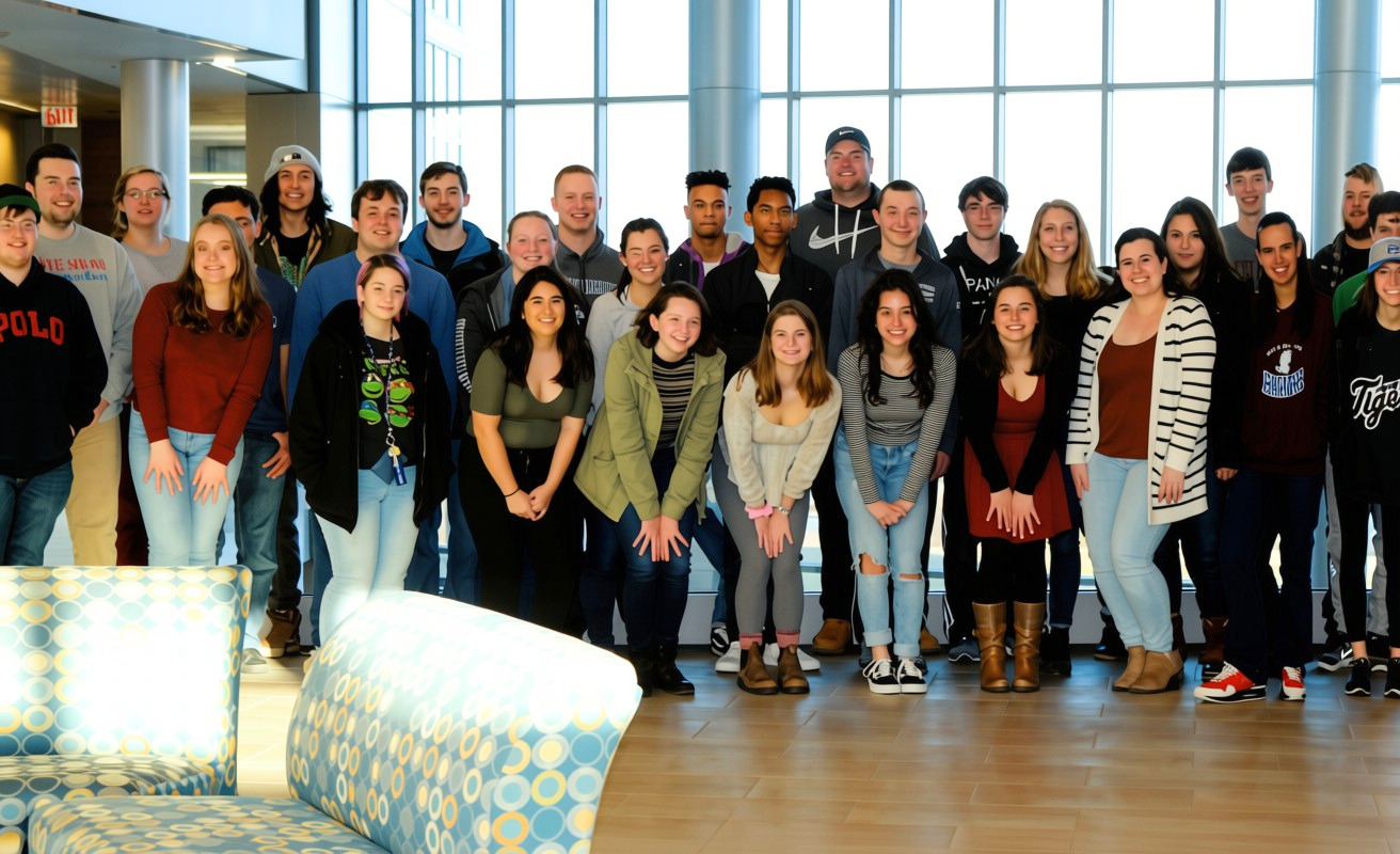 From The Archives (Crossings | 2018) WQRI members pose for a photo in Global Heritage Hall.