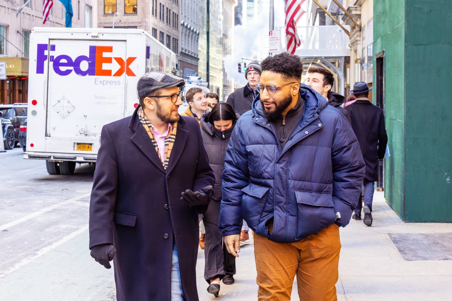 Derek Dandurand ’11, M’14 walks through the streets of New York City with RWU students participating in the Real Estate Externship program.