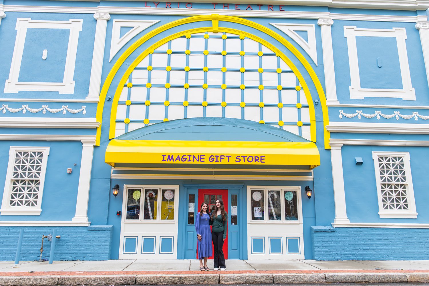 Imagine Gift Store owner Michelle Santiago ’11 and senior Alyssa Fournier meet outside the the region’s largest gift shop.