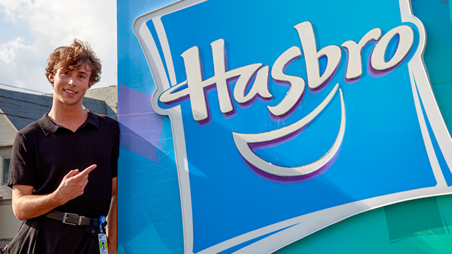 Cooper Hughes outside Hasbro’s Pawtucket headquarters, where he gained real-world experience as a Brand Publicity Intern.