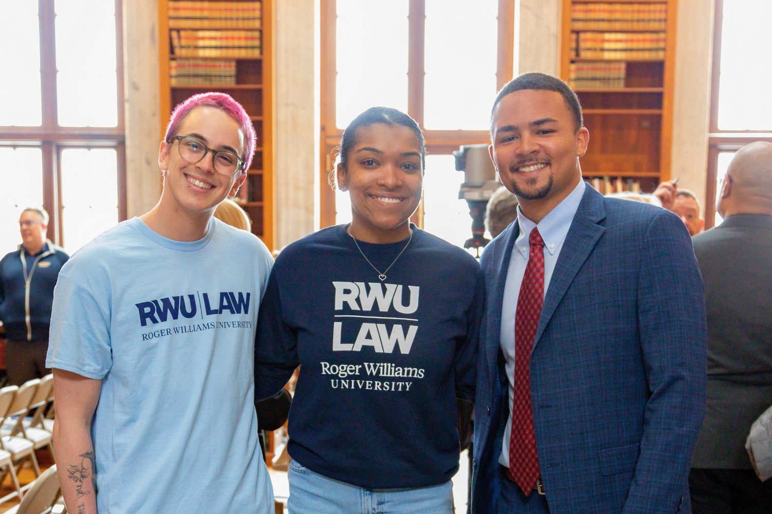 Isiah DiPina 2L, right, poses inside the Rhode Island State Library.