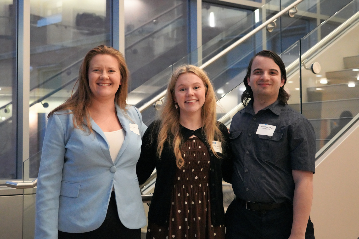 Sadie Phelan ’18, left, recipient of the Best Poster Award at the Graduate Student Poster Presentation.