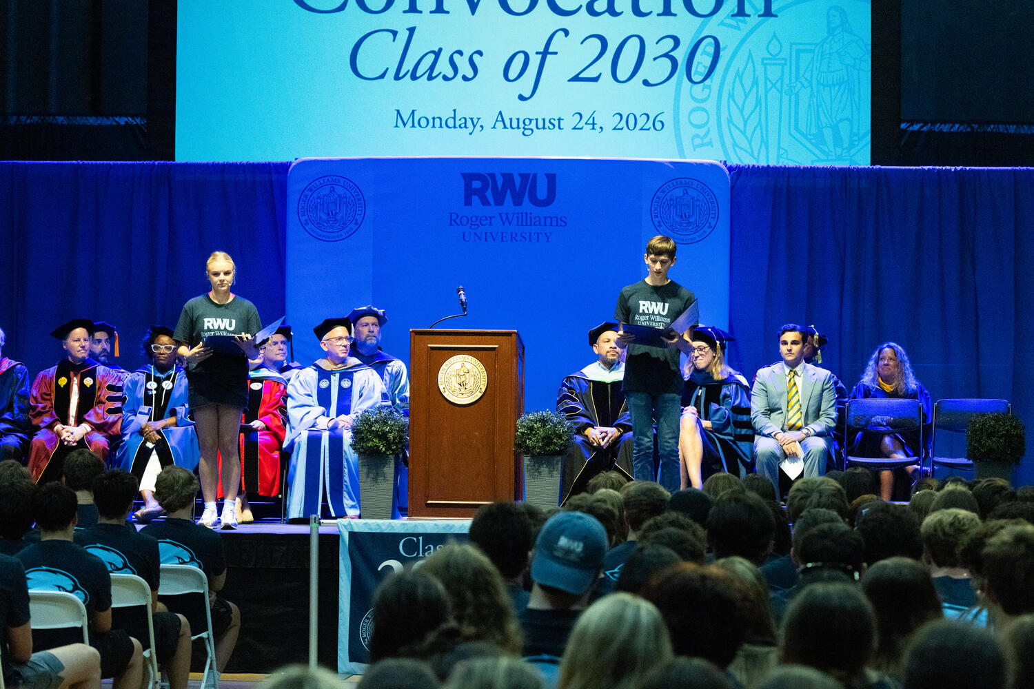 First-year students Ailey Olofson and Arden Hall present the Class of 2030 Antiphon during Convocation.