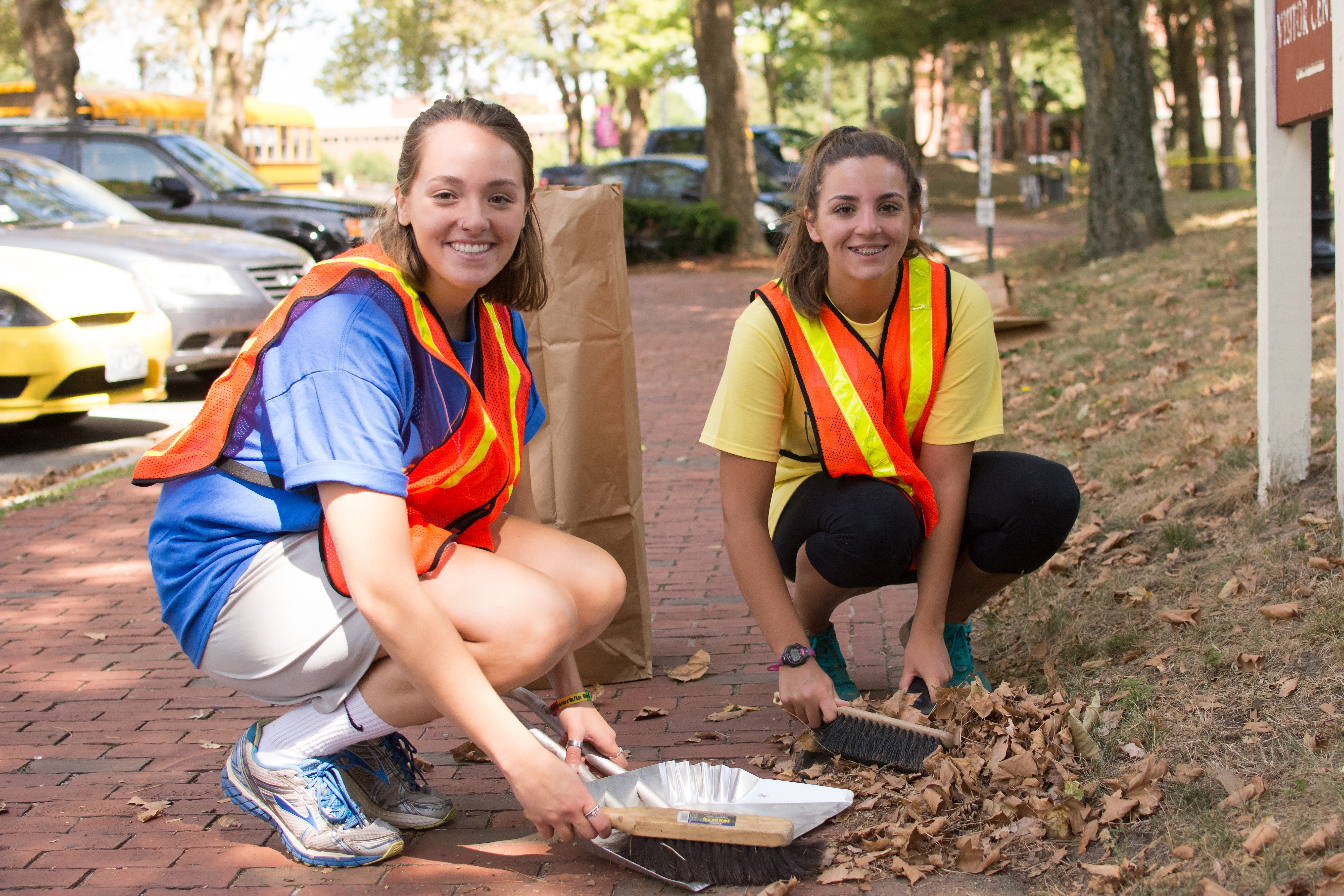 Students clean trash from street