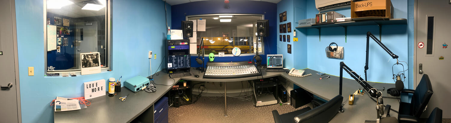 Chris Belmonte spends some time inside the WQRI booth in the Campus Recreation Center.