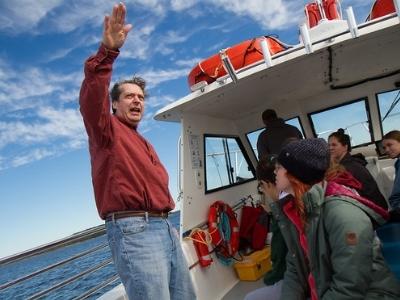 A professor and students on the InVinceable Spirit research vessel. 