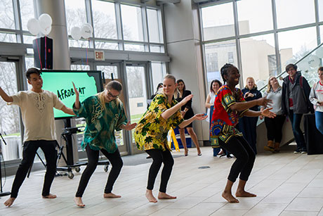Students perform an original dance at the opening reception of the New and Dangerous Ideas zine.