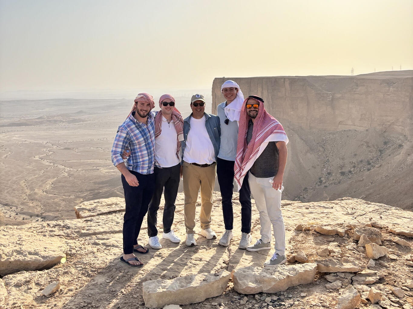 A journey into the desert offered sweeping views from a dramatic cliffside, along with encounters with camel herders.