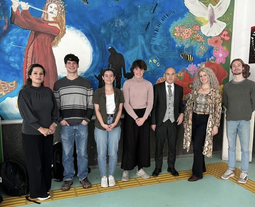 Zoey Cormican ’25 poses with local school leaders and Peace Corps counterparts in North Macedonia.