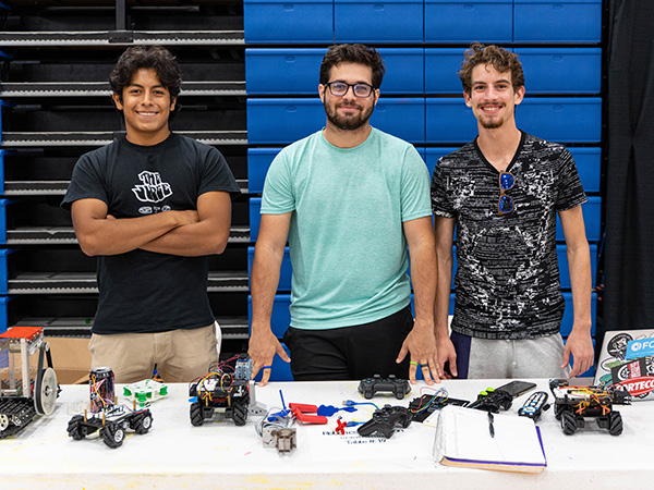 Members of the Robotics Innovation club tabling at a student involvement fair