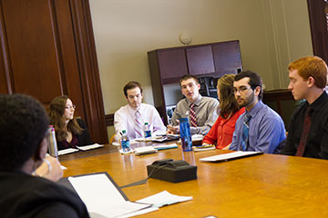 Students advocate for policy change to state legislators.