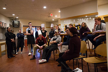 Students discuss what they learned in the meal-budget challenge.