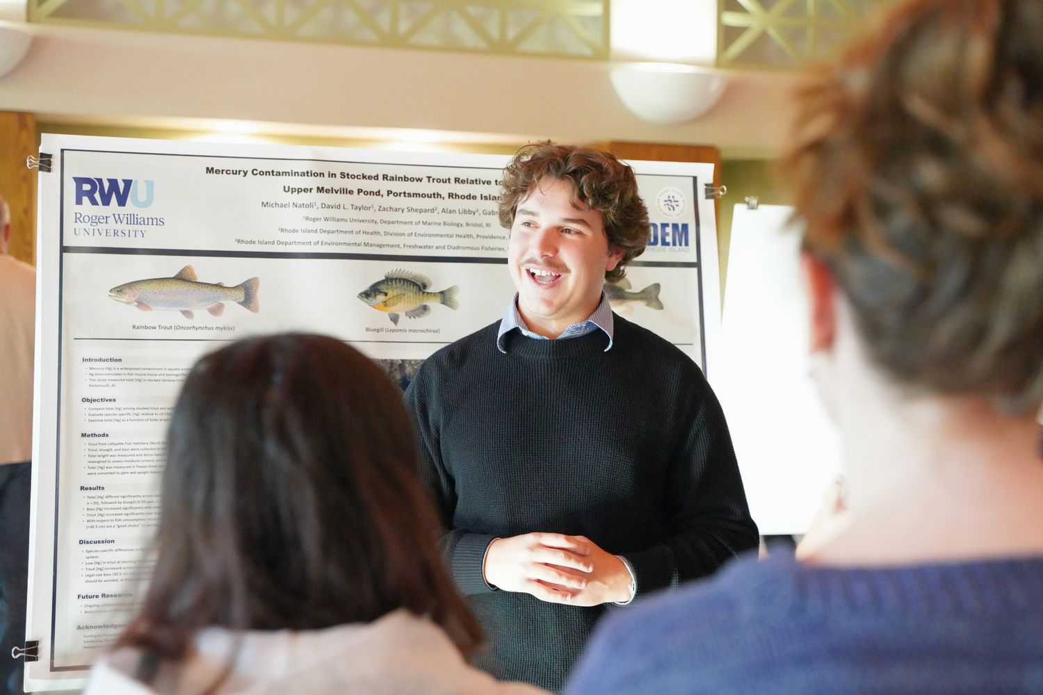Junior Michael Natoli presents his research at the Summer Research Showcase in the Marine and Natural Sciences Building on Oct. 7.