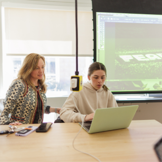 professor helping students