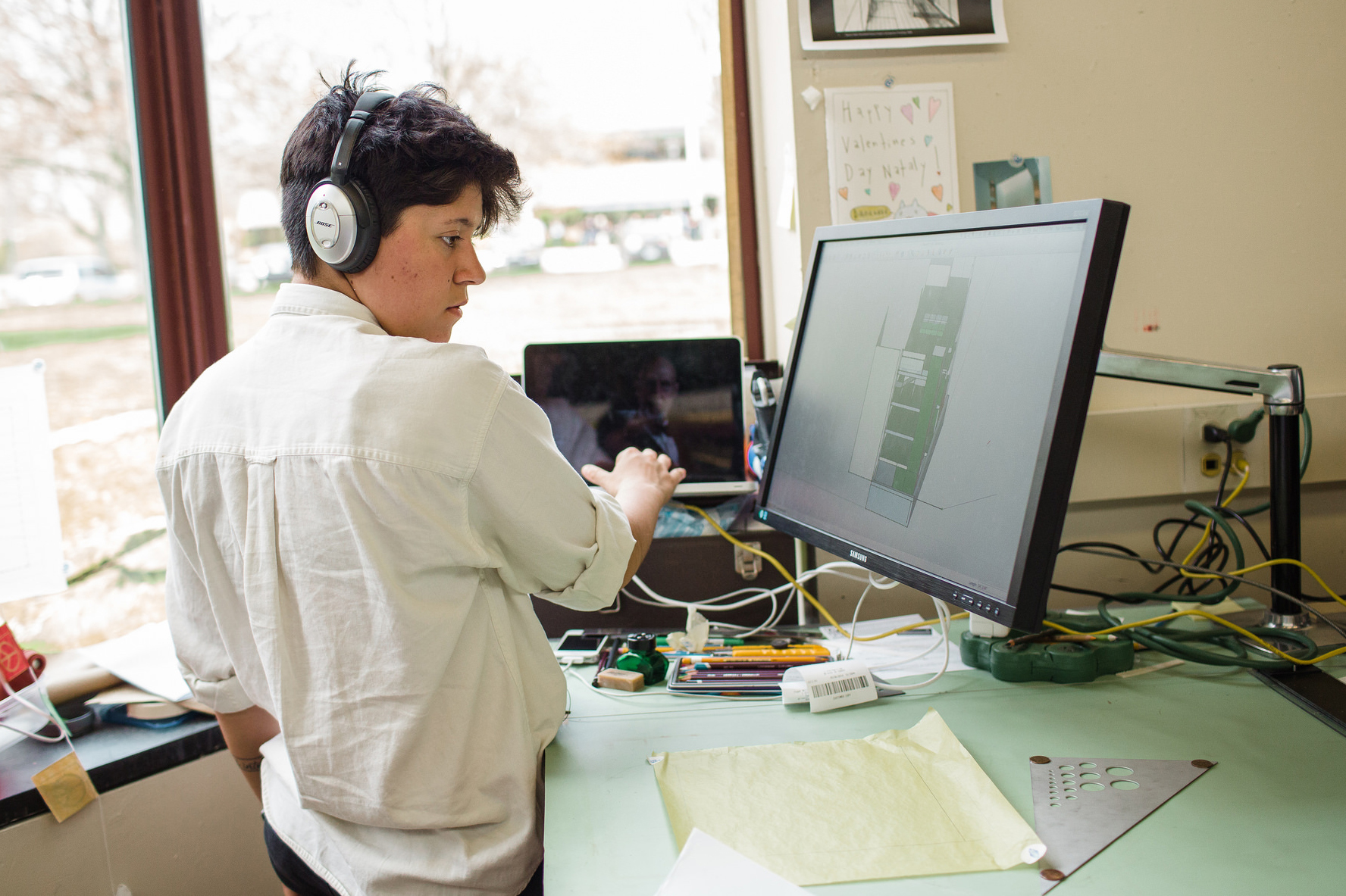 Student working on a rendering.
