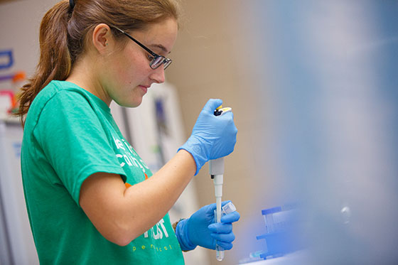 Student doing experiments.