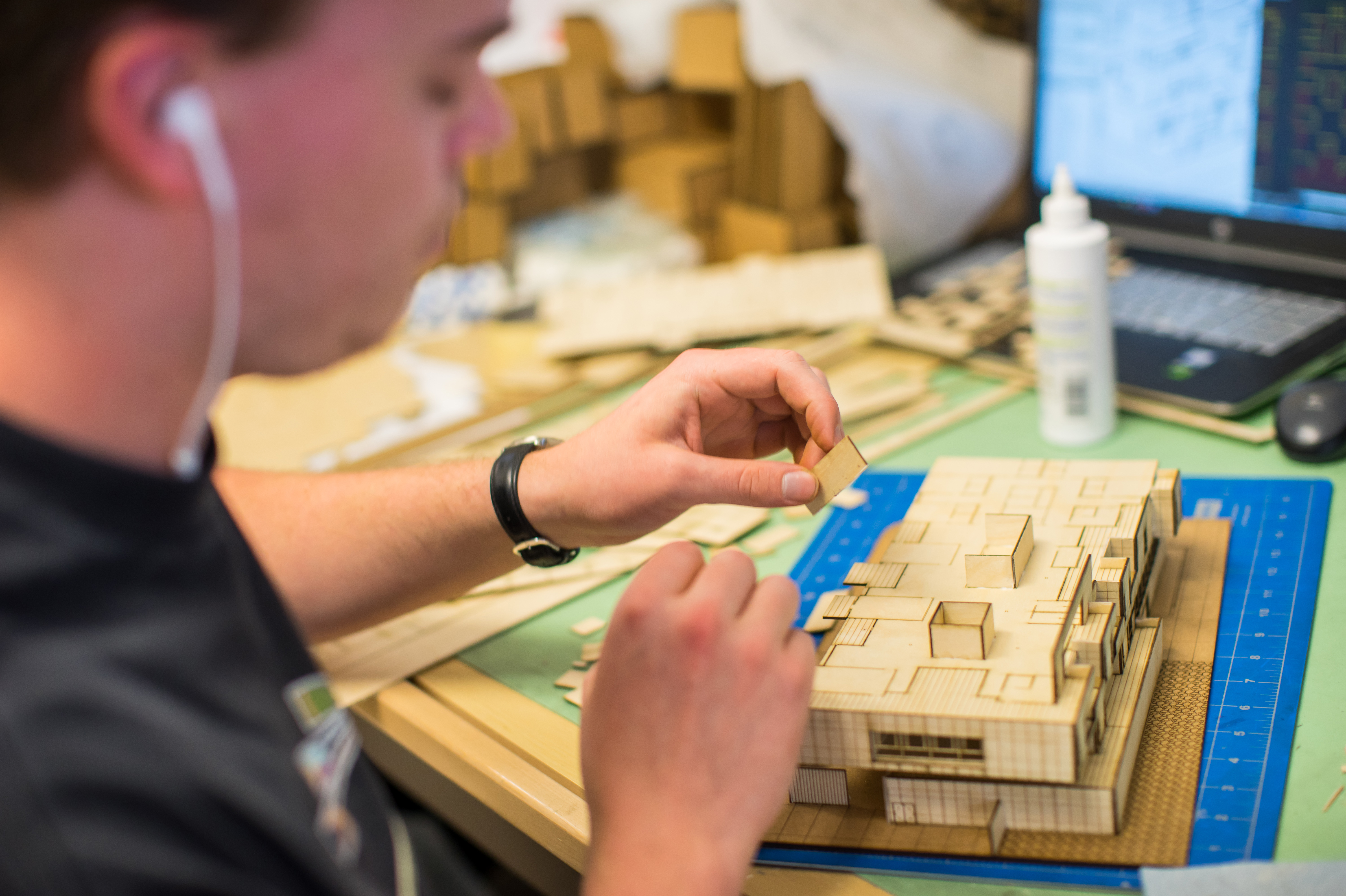 Student creating a 3D model.