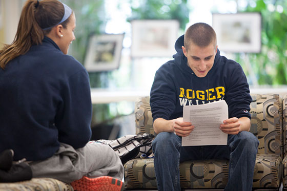 Student reading in library.