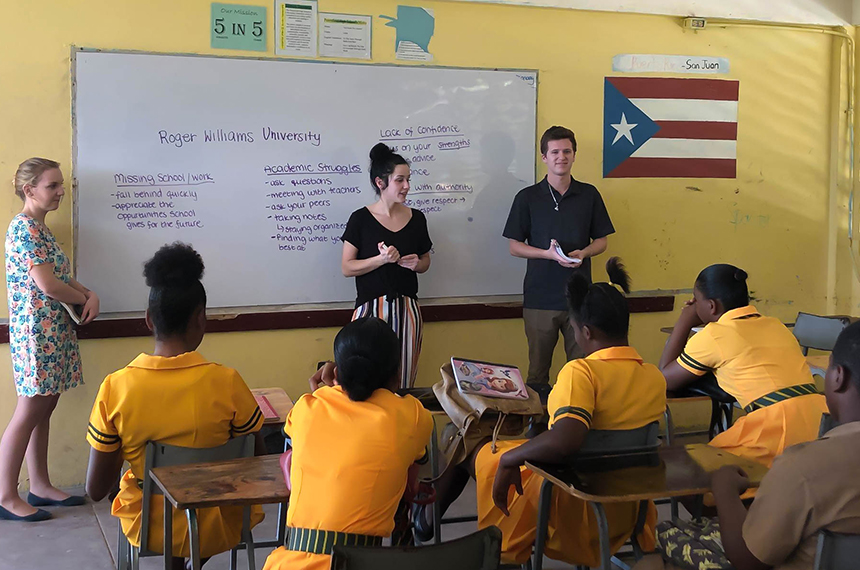 Students presenting to Jamaican high school students