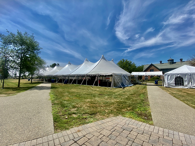 image of the large dining tent on the SAAHP quad at RWU's Bristol Campus