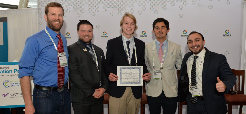 Students stand with best undergraduate project certificate at NEWEA conference