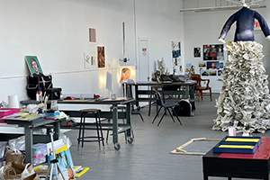 I'mage of art in white studio space with large sculpture visible