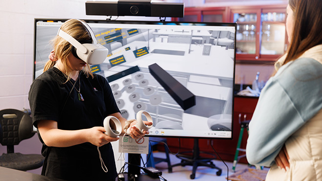 image of student using calculator built-in to forensic science VR program