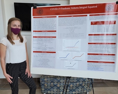 Student presents poster at Student Academic Showcase and Honors event