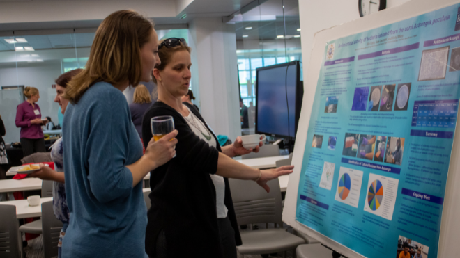 Student presents research poster
