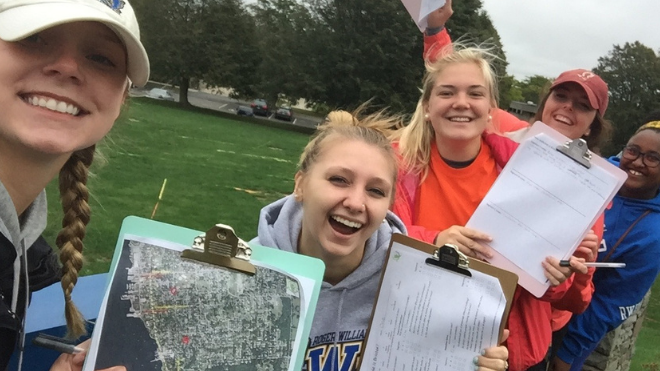 Students holding clipboards