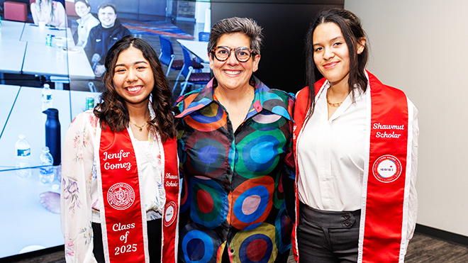 Shawmut Scholars pose with Marianne Monte of Shawmut at a scholarship reception.