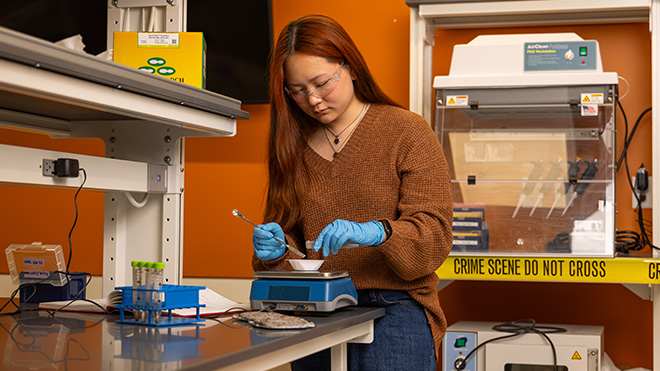 Paige Morris working in the Forensics lab.