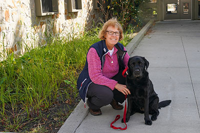 Dr. Claire Wiseman with her therapy dog, Harper. 