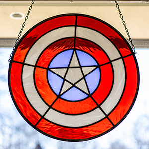 A stained glass Captain America shield
