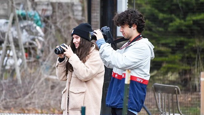 Students capture powerful community stories through photography as part of the Communities of Hope Civic Media initiative.