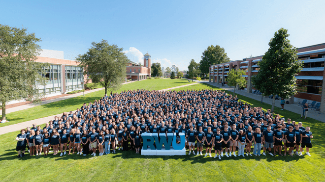 The Class of 2030 gathers for a group photo prior to the Convocation ceremony.