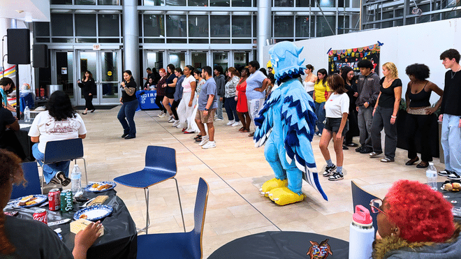 Students fill the atrium with movement during Noche Latina, dancing together as RWU kicks off its Hispanic Heritage Month celebrations.