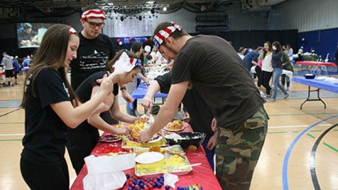 Students compete in cake decorating contest.
