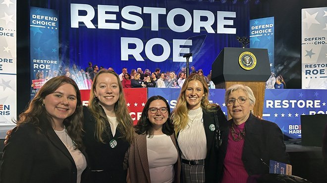 Emma Hall, her co-workers, and FMF President Eleanor Smeal at the Biden Restore Roe Campaign Rally.