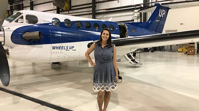 Francesca Montemarano in front of an airplane