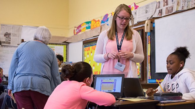Elise Frank '17 works with students at George J. West Elementary School