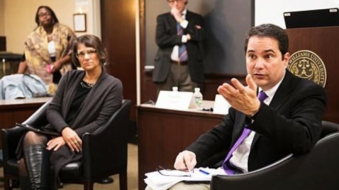 Law professors share their expert opinions during program.