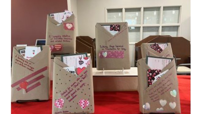 Books in brown paper wrappers