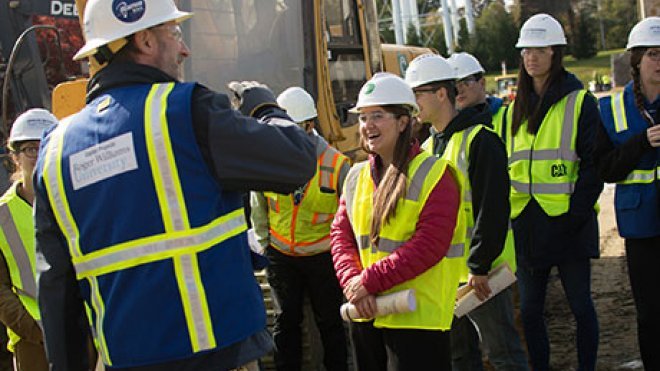 Students learn the construction process from the SECCM Labs project.