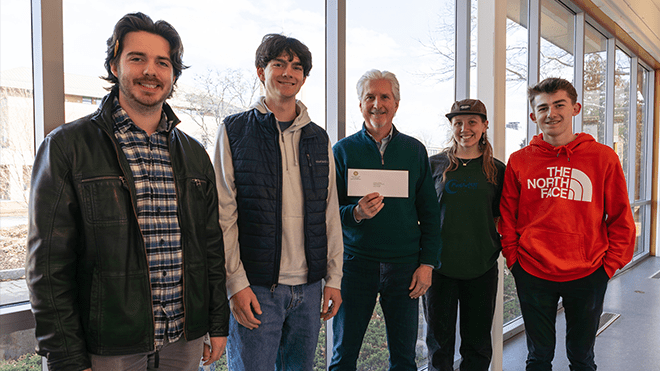 Members of AIAS Freedom by Design accept donation from the Bristol Rotary Club